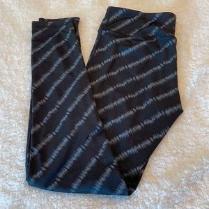 Small black with grey/silver design running leggings